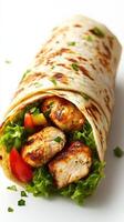 Grilled chicken wrap with fresh vegetables in a soft tortilla, perfect for a healthy meal on the go photo