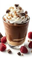 Decadent chocolate dessert layered with cream and garnished with raspberries showcased in a glass cup photo