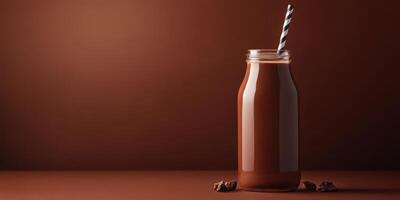 Creamy chocolate beverage in a glass bottle with a striped straw, emphasizing rich textures and tones in a warm setting photo