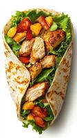 Delicious grilled chicken wrap filled with fresh vegetables and vibrant toppings photo