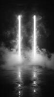 Mysterious fog surrounds glowing vertical lights in a darkened space during an artistic installation photo