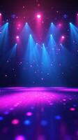 Colorful stage lights illuminate a dance floor for a vibrant party atmosphere at night photo