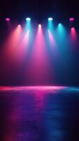 Colorful stage lighting creates a vibrant atmosphere in an empty performance space ready for an event photo