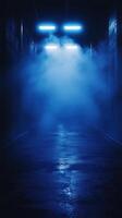 Dark alley illuminated by blue neon lights creating a mysterious atmosphere in an urban setting at nighttime photo