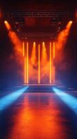 Bright orange and blue stage lighting with fog and dramatic atmosphere for a performance or event photo