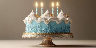 Beautiful blue frosted cake decorated with candles and swirls for a birthday celebration photo