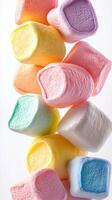 Colorful marshmallows stacked in a vibrant arrangement for a playful dessert presentation photo