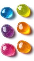 Colorful jelly candies displayed in a creative arrangement on a white background photo