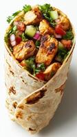 Delicious grilled chicken wrap filled with fresh vegetables and herbs ready for a flavorful bite photo