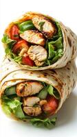 Delicious grilled chicken wrap filled with fresh vegetables and greens prepared for a healthy meal option photo