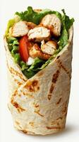 Fresh grilled chicken wrap with lettuce and tomato served in a warm tortilla photo