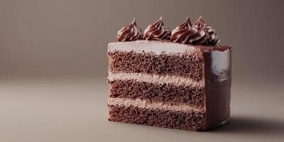 Decadent chocolate cake slice with rich frosting displayed on a neutral background photo
