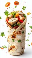 Delicious grilled chicken wrap filled with fresh vegetables and spices for a healthy meal option photo