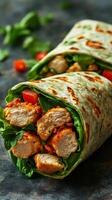 Delicious grilled chicken wraps filled with fresh greens and tomatoes prepared in a rustic kitchen setting photo