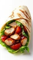 Delicious grilled chicken wrap with fresh vegetables and sauce prepared in a modern kitchen photo