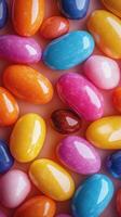 Colorful candy-coated eggs arranged in a vibrant display for festive celebrations and sweet enjoyment photo