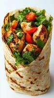 Grilled chicken wrap filled with fresh vegetables, perfect for a healthy meal on the go photo