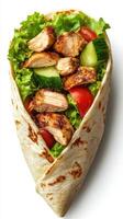 Freshly made chicken wrap with crisp vegetables and savory spices ready for enjoyment photo