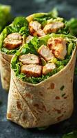Tasty chicken wraps filled with fresh lettuce and grilled chicken in a casual kitchen setting photo