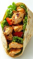 Grilled chicken wrap filled with fresh lettuce and tomatoes on a white background photo