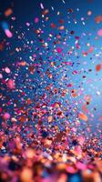Colorful confetti bursts creating a vibrant celebration atmosphere during a festive event photo