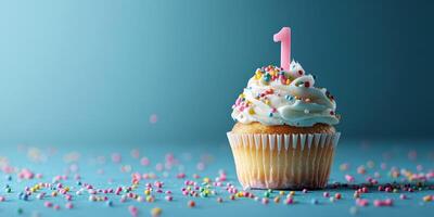Colorful birthday cupcake with festive sprinkles and a candle in a simple setting photo