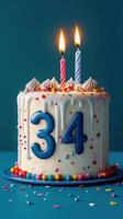 Festive birthday cake decorated with colorful candles and sprinkles for a 34th celebration indoors photo