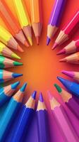 Colorful arrangement of crayons creates a vibrant circle on a bright background photo