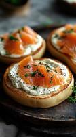 Delicious toasted bread topped with cream cheese, smoked salmon, and fresh herbs in a cozy setting photo