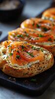 Delicious smoked salmon appetizers served on toasted bagels with cream cheese and herbs in a cozy setting photo
