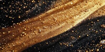 Sparkling golden particles shimmering in a black background creating an artistic display of colors photo