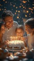 Family celebration with a cake and candles on a joyful evening with children smiling and enjoying the moment photo