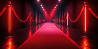 Elegant red carpet lined with velvet ropes creates a glamorous entrance in a dimly lit venue during an exclusive event photo