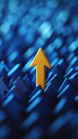 Colorful upward arrow stands out against textured blue background, symbolizing growth and progress in various contexts photo