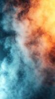Vibrant clouds of steam in contrasting shades of blue and orange creating a dramatic effect photo