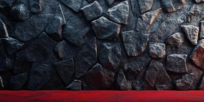 Textured stone wall with red floor provides a dramatic backdrop for creative projects in studio environment photo