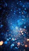 Dynamic blue and orange bokeh background with sparkling particles creating a mesmerizing visual effect photo