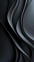 Curved textures in dark tones create a striking visual composition of flowing shapes and lines photo