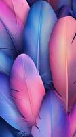 Colorful feathers in gradient shades of pink and blue arranged artistically for a vibrant decorative effect photo