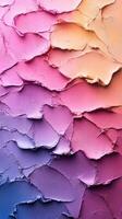 Textured abstract design of layered paint creating a gradient of pinks and purples across the canvas photo
