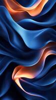 Flowing waves of blue and orange fabric create an abstract visual effect in a soft, textured arrangement photo