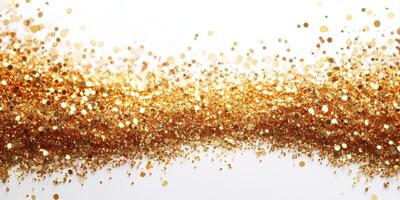 Golden glitter particles sparkle against a white background during a festive celebration or craft activity photo