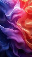 Colorful flowing fabric waves create a vibrant visual display with smooth gradients in a seamless swirl of hues photo