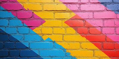 Vibrant graffiti mural with geometric shapes on a brick wall in an urban area during daytime photo