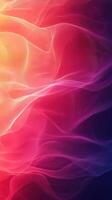 Vibrant flowing waves of color create a mesmerizing abstract background in shades of pink, orange, and purple photo