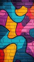 Colorful abstract mural covering a brick wall in an urban setting showcasing vibrant shapes and patterns photo
