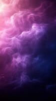 Colorful abstract swirl of purple and pink hues creating a dreamy cosmic atmosphere at night photo