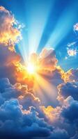 Bright sun rays shining through fluffy clouds at sunset creating a beautiful colorful sky photo