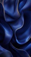 Elegant blue satin fabric swirling in soft waves with a smooth texture contrasting against light photo