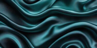 Luxurious deep teal silk fabric flowing with soft waves and gentle folds creating an elegant texture and rich color photo
